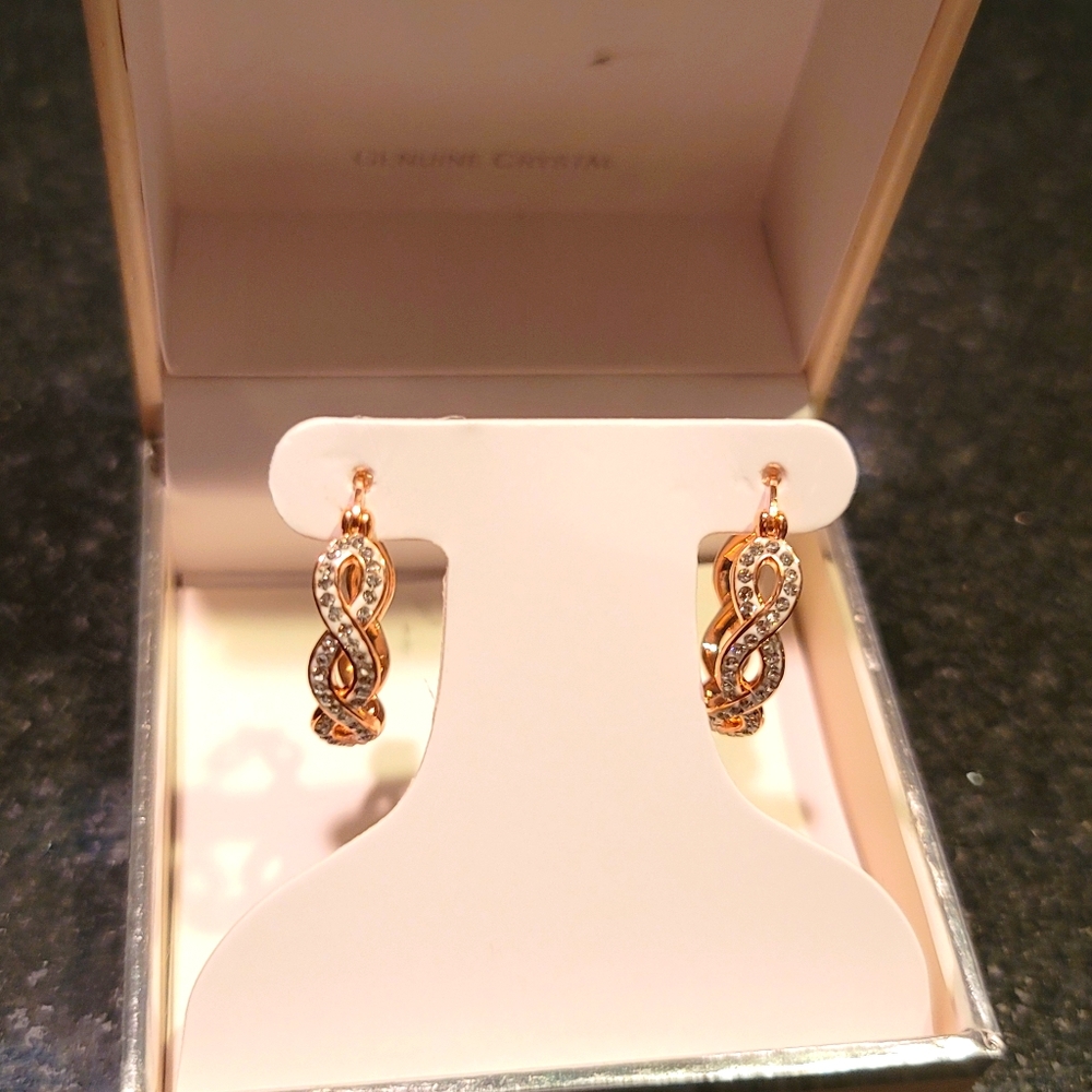 Rose gold hoop earrings with crystals